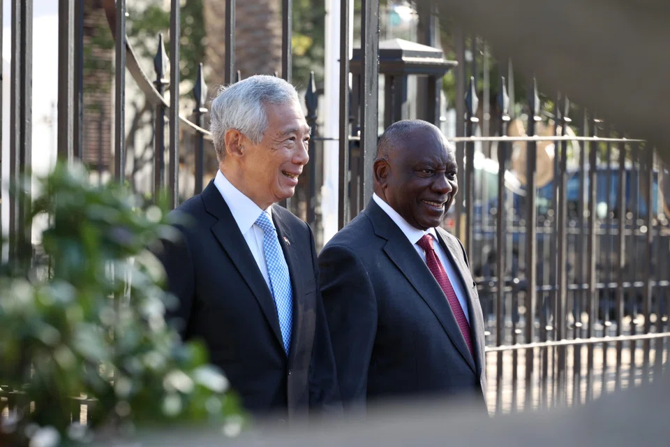 Prime Minister Lee Hsien Loong at a welcome ceremony at Tuynhuys, South Africa’s presidential office, with South African President Cyril Ramaphosa on May 16. 