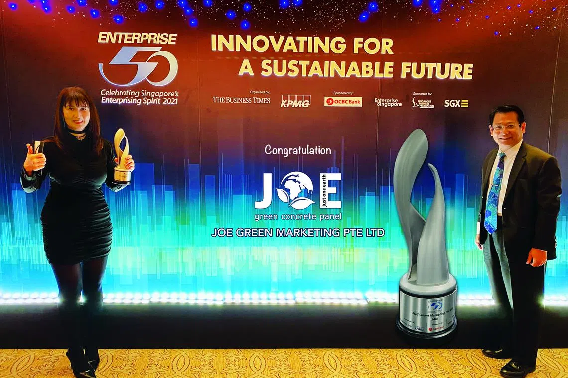 Joe Green Marketing's founder and managing director Boediman Widjaja (right) and marketing director Charlina Lim at the Enterprise 50 Awards in 2021.