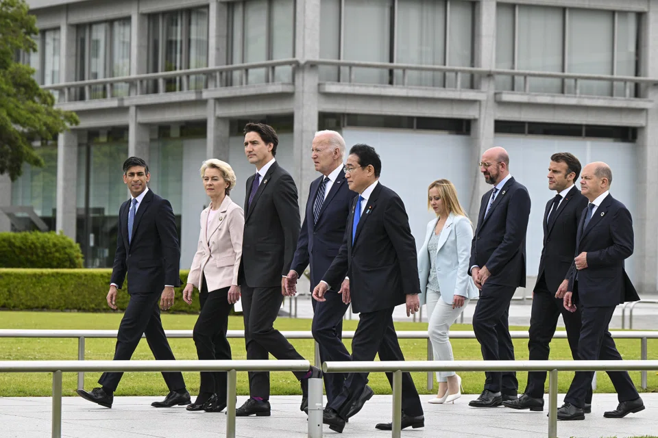 US President Joe Biden and other G7 leaders at Hiroshima Peace Park and Memorial Museum before participating in a wreath-laying ceremony, on the first day of the G7 summit in Hiroshima, Japan, May 19, 2023. 