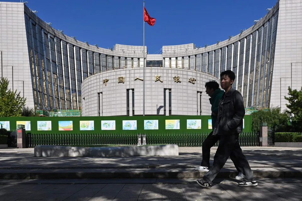 The one-year loan prime rate will stay at 3.10 per cent and the five-year rate remains at 3.60 per cent, according to a statement from the People’s Bank of China (top).