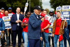 US President Joe Biden joins striking members of the United Auto Workers on the picket line outside the GM's Willow Run Distribution Centre in Belleville, Wayne County, Michigan, Sept 26, 2023. 