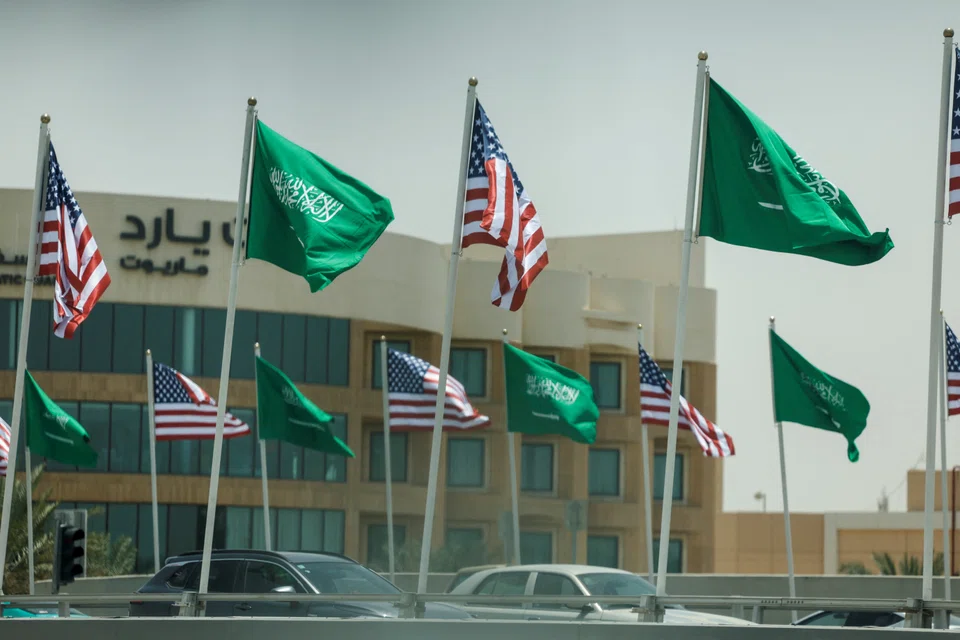 US and Saudi flags flutterING along a highway of Riyadh ahead of the arrival of Trump to Riyadh. Trump has long enjoyed a close relationship with Gulf Arab states, in particular the UAE and Saudi Arabia. 
