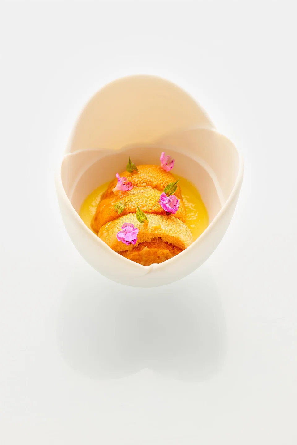 Corn custard topped with uni.