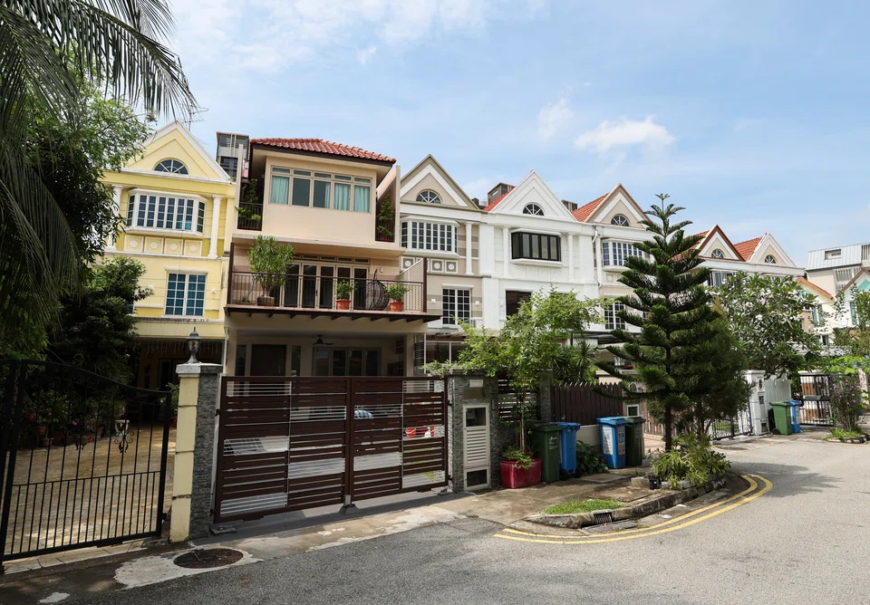 A row of 99-year leasehold terrace houses along Jalan Rindu.