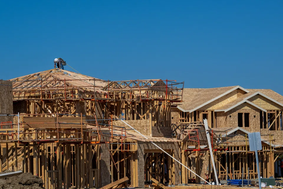 Home closings among publicly traded builders are expected to rise a bit next year after an anticipated 4% drop in 2025.