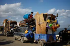 Displaced Palestinians move southward after Israeli forces ordered residents of Gaza City to evacuate to the south. Only 21 per cent of Israeli adults think Israel and a Palestinian state can co-exist peacefully – the smallest share since they began asking the question in 2013.