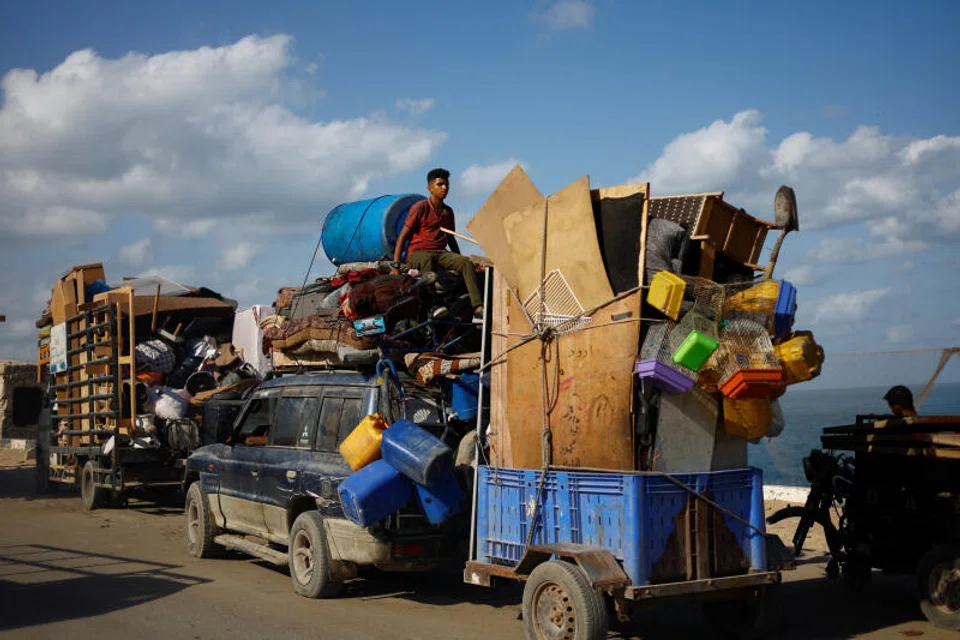 Displaced Palestinians move southward after Israeli forces ordered residents of Gaza City to evacuate to the south. Only 21 per cent of Israeli adults think Israel and a Palestinian state can co-exist peacefully – the smallest share since they began asking the question in 2013.