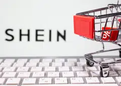 FILE PHOTO: A keyboard and a shopping cart are seen in front of a displayed Shein logo in this illustration picture taken October 13, 2020. REUTERS/Dado Ruvic/Illustration/File Photo