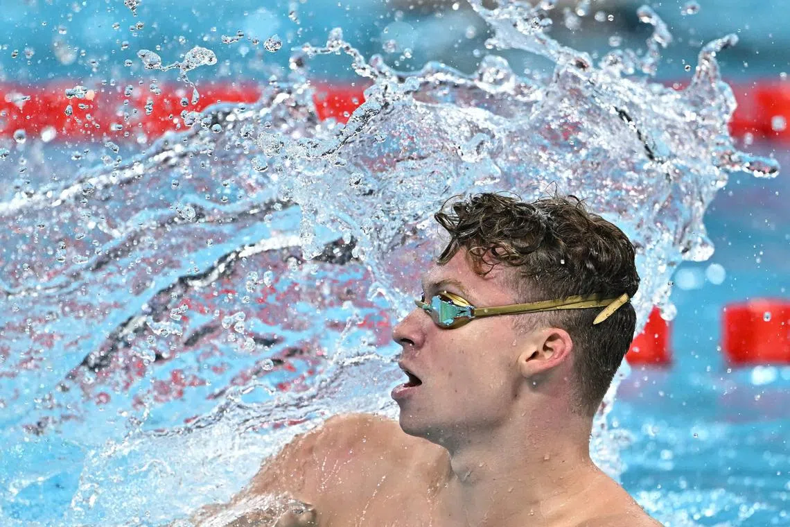 French swimming sensation Leon Marchand wins the final of the men's 200m breaststroke during the Paris Olympic Games at the La Defense Arena.