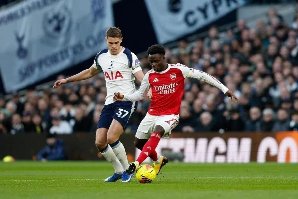 Micky van de Ven of Tottenham (left) in action against Bukayo Saka of Arsenal during their English Premier League match at the Tottenham Hotspur Stadium in London on Feb 22.