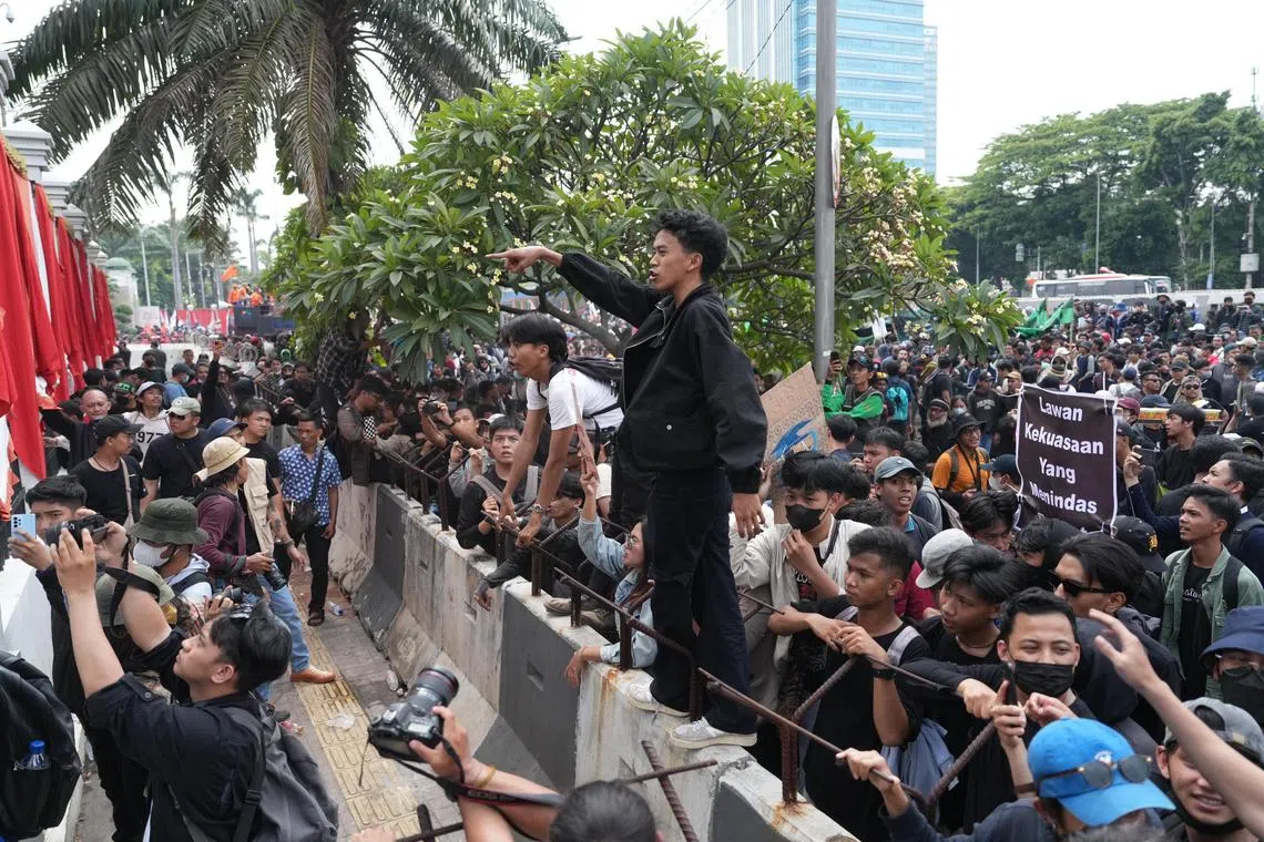 Thousands of police officers have been deployed near Indonesia’s parliament, amid growing anger over plans for electoral changes that would effectively favour the alliance of President Joko Widodo and his incoming successor, Prabowo Subianto. 