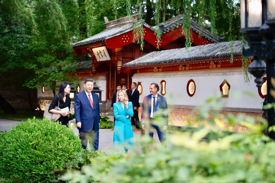 Italian Prime Minister Giorgia Meloni (third from left) and Chinese President Xi Jinping (second from left) in Beijing. Meloni is seeking to reset bilateral relations after Italy pulled out of the Belt and Road agreement.