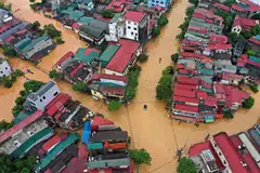 Flooded streets in Yen Bai in the aftermath of Typhoon Yagi hitting northern Vietnam. The storm has continued to unleash heavy rains, triggering landslides and structural collapses across cities and provinces. 