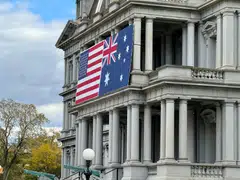 Flags of Australia and US adorn the Eisenhower Executive Office Building of the White House in Washington, DC on Oct 21, 2023 ahead of Australian Prime Minister Anthony Albanese's state visit.