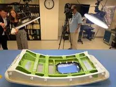 Members of the news media view the Alaska Airlines Flight 1282 door plug at the National Transportation Safety Board (NTSB) materials lab in Washington, US, July 30, 2024. 