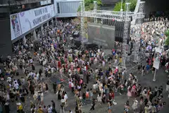 Taylor Swift fans hanging around the outdoor area of Kallang Wave Mall, which generally sees high footfall during the concert periods. 