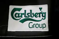 The sale may not proceed if an agreement between Carlsberg and Sapporo cannot be reached on the ownership ratio and other terms.