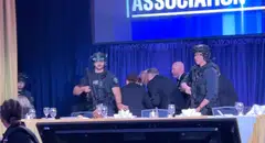 US President Trump is escorted out as a shooter opens fire during the annual White House Correspondents' Association dinner in Washington on Apr 25.