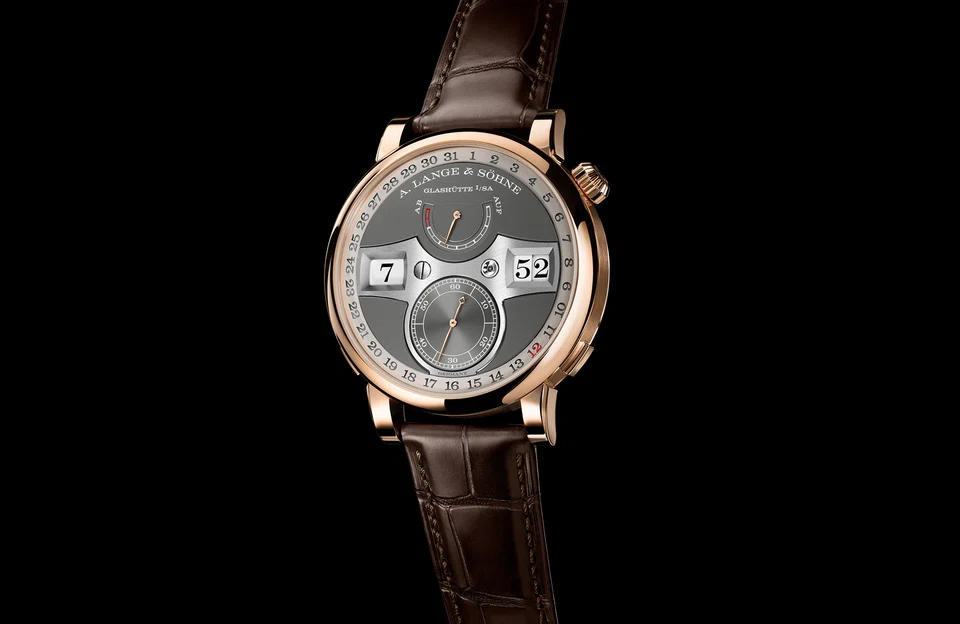 A Lange & Sohne recently presented a new version of the Zeitwerk, the first in the collection to combine the warm hue of pink gold with a grey dial.