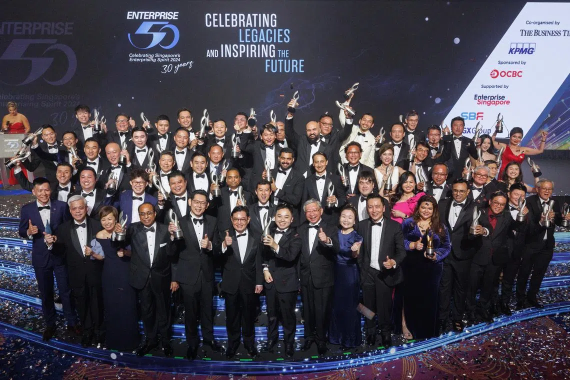 E50 winners, guest of honour, Deputy Prime Minister Heng Swee keat (front row, sixth from left); organisers and sponsor of the E50 gala event at the end of the evening’s programme.