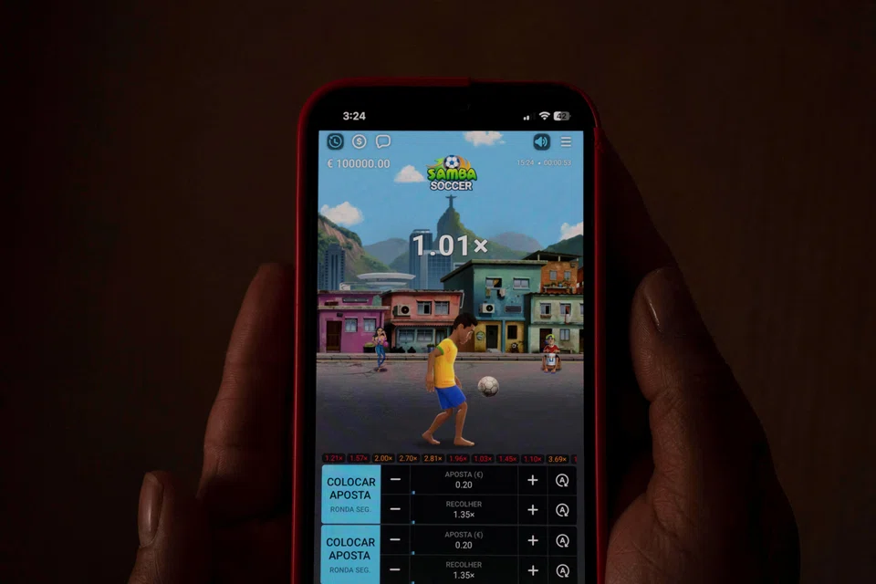 An online betting game is displayed on a mobile phone, Sao Paulo, Brazil, Sept 19, 2024. 
