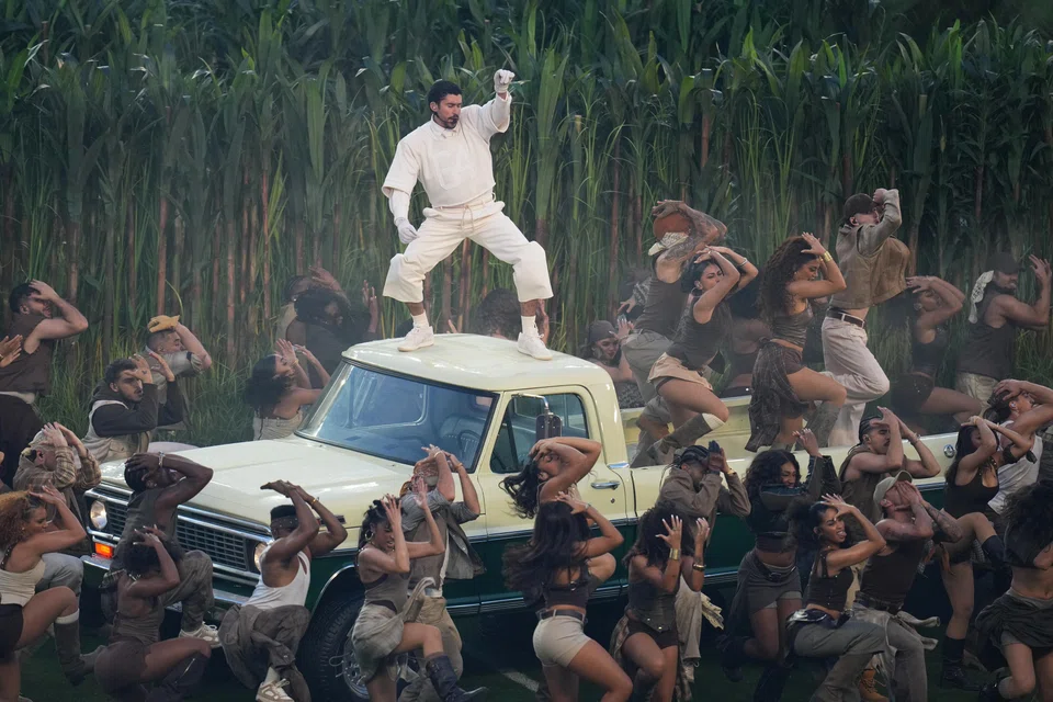 In one of the show’s most theatrical moments, Bad Bunny crashed through the ceiling of La Casita, then moved to a white truck where dancers grooved to a medley honouring reggaeton’s roots.