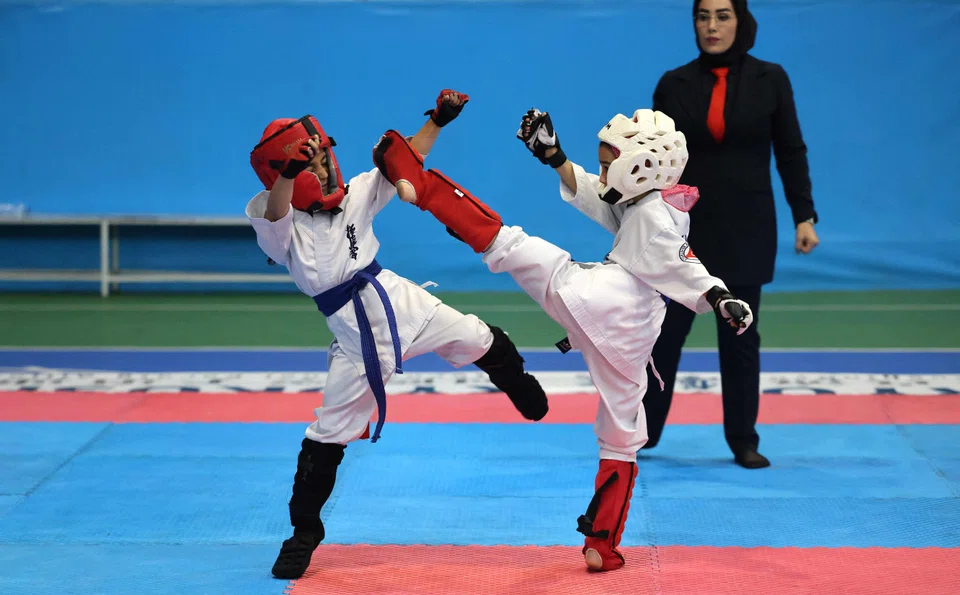 As more women turn to karate, the sport has become a symbol of Iran’s changing society, where a young, urban generation is quietly challenging traditional gender roles and societal norms.