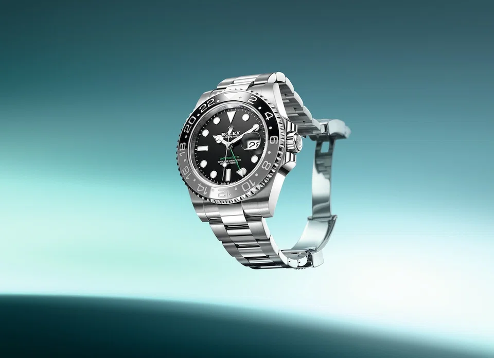 The Oyster Perpetual GMT-Master II bezel evokes the transition between day and night.