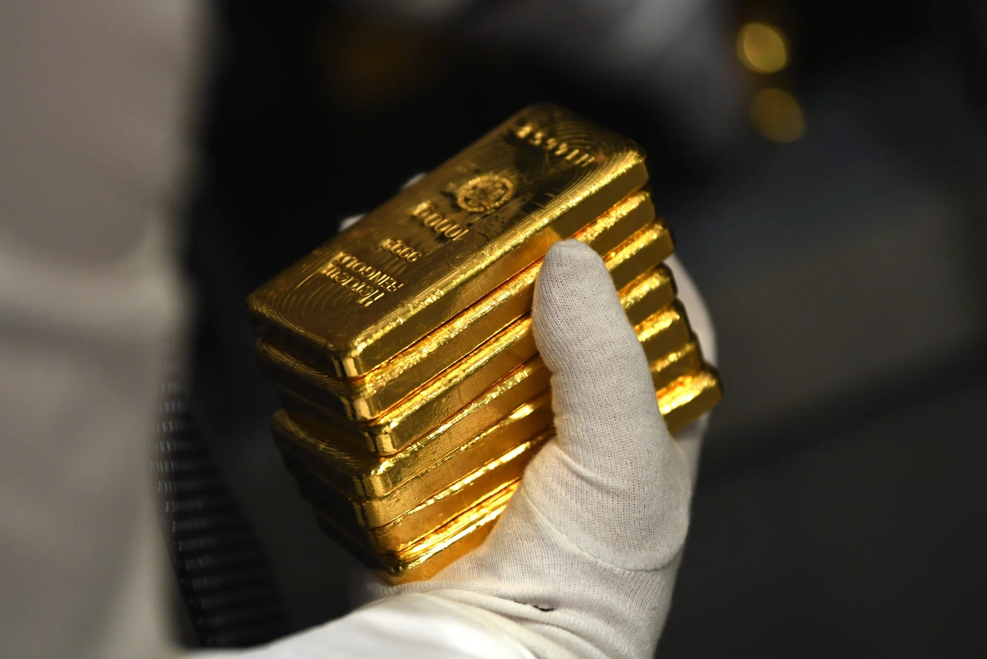 Gold subdued on US dollar strength as markets await economic data - The ...