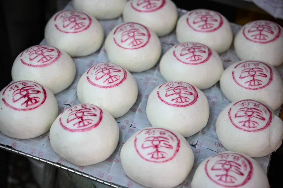 Buns are laid out at a bakery on the island of Cheung Chau ahead of its traditional Bun festival in Hong Kong.
