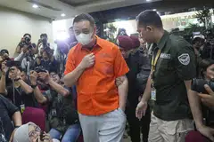 Lin Qiang, chairman and controlling shareholder of HHSC, was detained shortly after arriving in Bali.