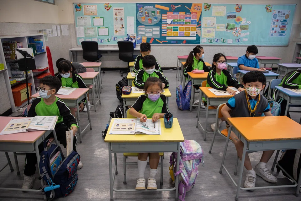 Primary school students attend classes in Hong Kong, China, April 19, 2022. 