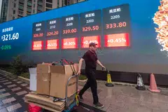 China’s bond traders are dumping short-term debt on concerns that easing Covid-lockdowns may boost demand for cash and lead to a liquidity crunch.