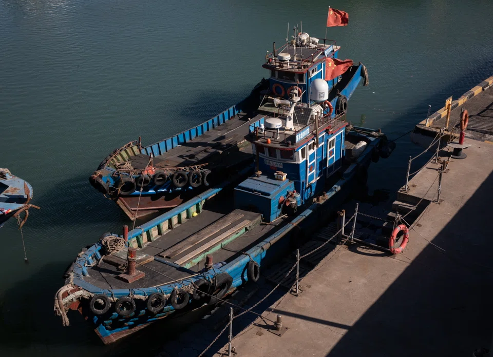 Oil ships docked at a Chinese port. For China and many other developing countries, barrels from Russia, Iran and Venezuela – the three major oil producers under Western sanctions – are as good as any.