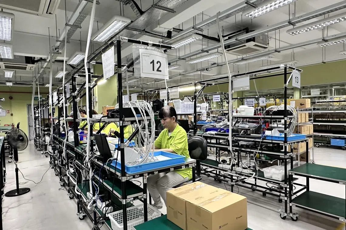 Mercantile Pacific Asia's warehouse in Singapore. With around 100 employees, the Singapore facility has the capacity to handle up to a million units of used devices a year.