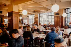Diners toast at Brat in the Shoreditch neighbourhood in London. The city is one of the world's best for wine; you can find terrific lists in pubs, bars and all sorts of restaurants in almost any neighbourhood. 