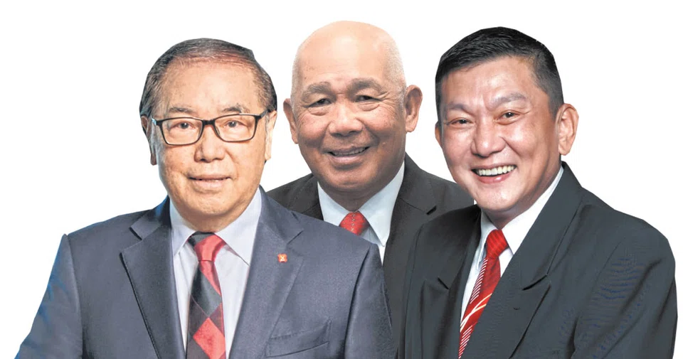 DBS chairman Peter Seah (left), SBS Transit chairman Bob Tan (centre) and Qian Hu's executive chairman Kenny Yap (right)