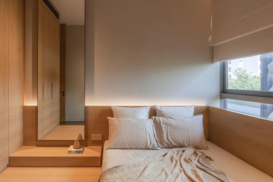 The parents’ home has a light palette and forms that sit nearer to the ground.