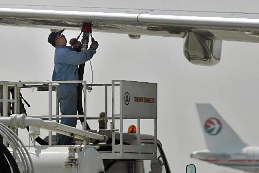 China Aviation Oil's parent China National Aviation Fuel will merge with Sinopec.