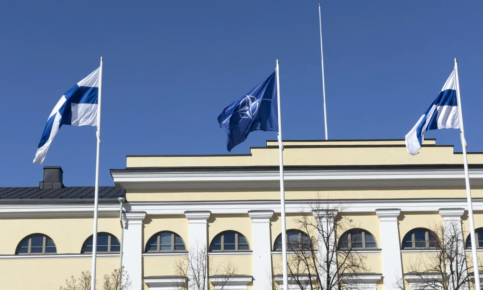 The flags of Finland and Nato fly in front of the Finnish Foreign Ministry building in Helsinki, after the country became the 31st Nato member on 4 Apr 2023.