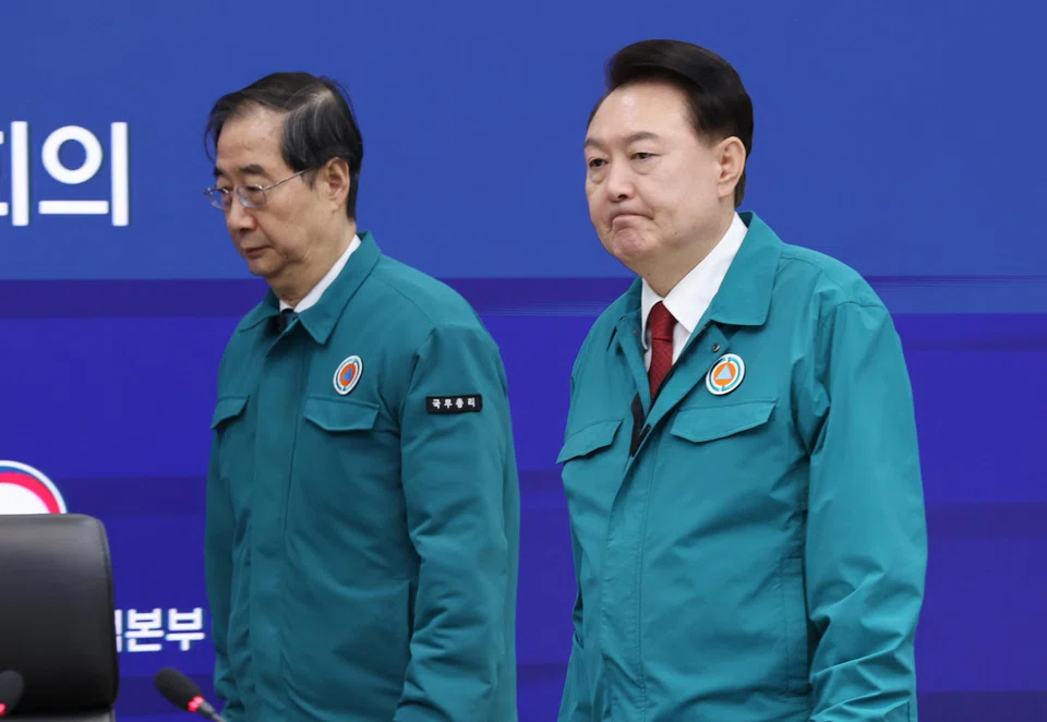 President Yoon Suk Yeol (R) has spearheaded a package of medical reform plans and taken a hard line against the protesters, moving to suspend their medical licences for defying return-to-work orders.