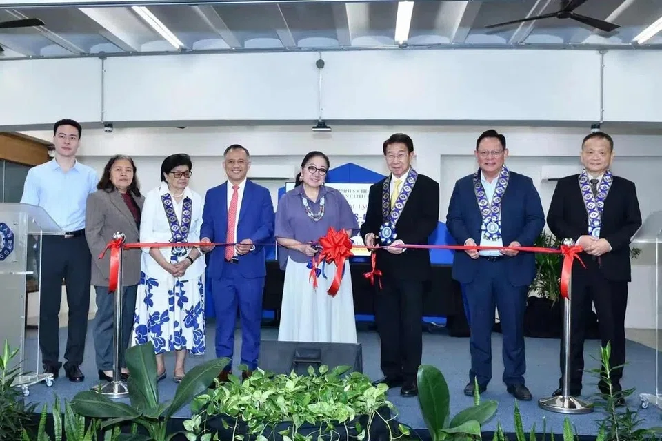 Philippines-China Studies Center’s director Rommel Banlaoi (fourth from left) leading its opening at Diliman College in the Philippines on Nov 18.