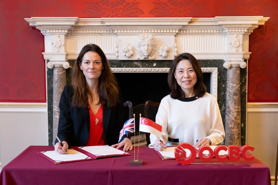 UK Minister for Investment Poppy Gustafsson (left) and OCBC’s head of global corporate banking Elaine Lam at the signing. 