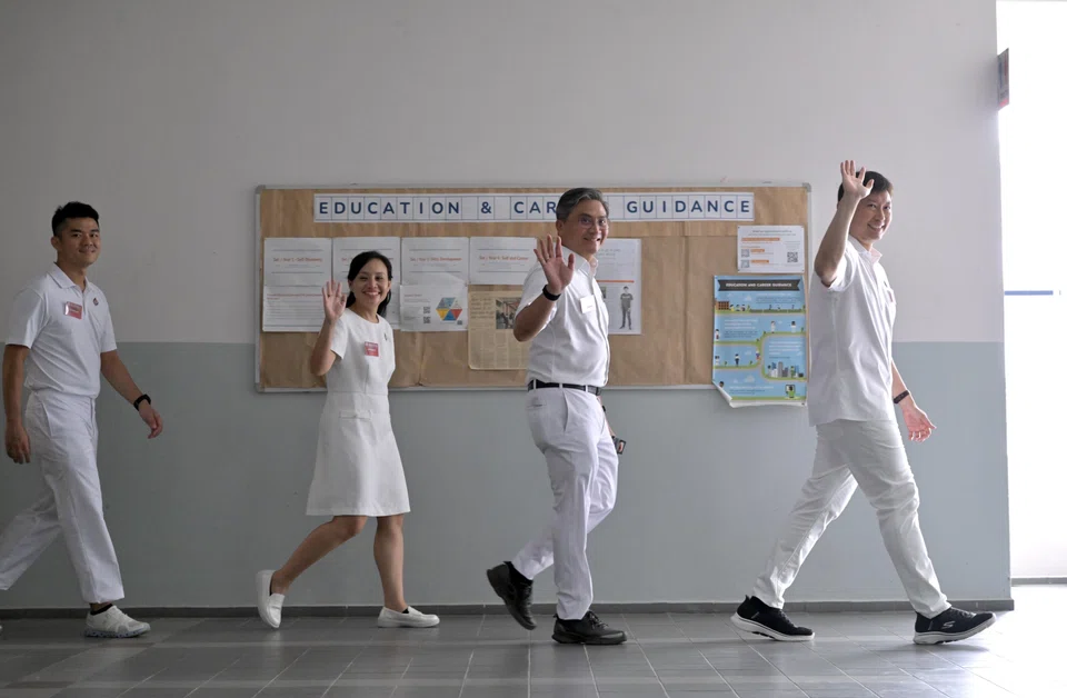 PAP's Bishan-Toa Payoh GRC slate featuring (from left) Cai Yinzhou,  Elysa Chen, Saktiandi Supaat and Transport Minister Chee Hong Tat.