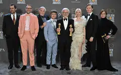 US director Steven Spielberg (centre) poses with the awards for Best Director - Motion Picture and Best Picture - Drama for "The Fabelmans" alongside Seth Rogen (2nd left), Michelle Williams (3rd right) and US actor Paul Dano (right) at the 80th annual Golden Globe Awards in Beverly Hills, California, on Jan 10, 2023. 