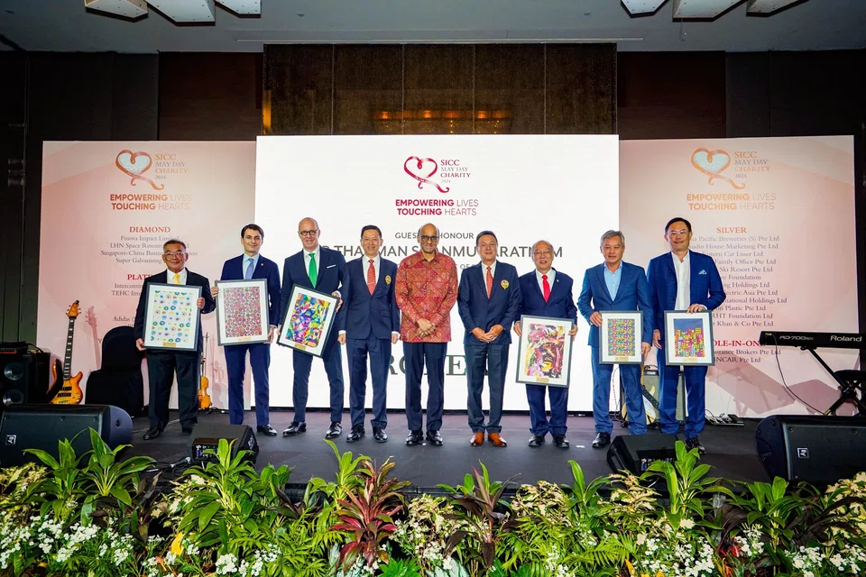 President Tharman Shanmugaratnam (centre) with the top sponsors of this year's SICC May Day Charity at a gala dinner on May 1, 2024.