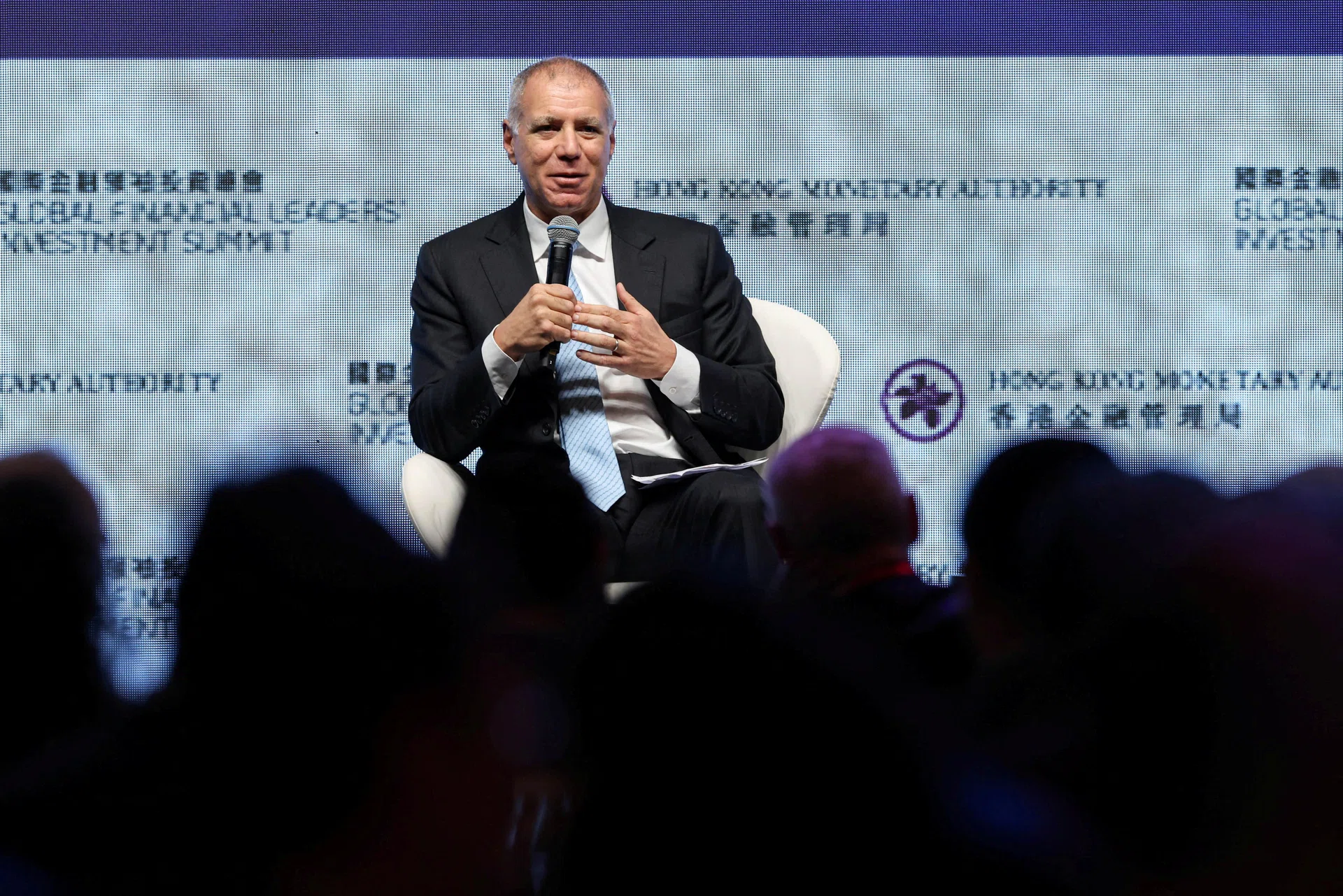 HSBC CEO pitches to Hong Kong clients, hires more bankers amid stiff competition