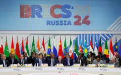 A plenary session of the Brics Summit held in the Russian city of Kazan, with Russian President Vladimir Putin in the centre.