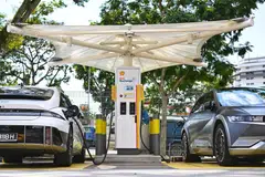 Electric cars getting charged at a Shell station in Singapore.  The availability of charging infrastructure is as critical as any other factor in driving EV adoption in the region.