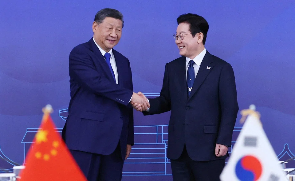 China's President Xi Jinping shakes hands with South Korea's President Lee Jae Myung in Gyeongju, South Korea, Nov 1, 2025. The upcoming visit marks the second meeting between Xi and Lee in just two months.